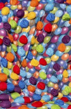 A bright and colorful image featuring a multitude of balloon patterns in a hot air balloons