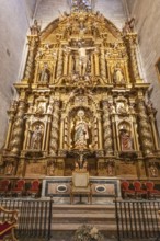 Elaborately designed baroque altar with golden sculptures and decorations, Seville