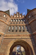 City gate Lübeck Holstentor, inscription Concordia domi foris pax with the meaning harmony inside