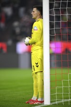 Goalkeeper Michael Zetterer SV Werder Bremen SVW (01) leans against goalpostsAllianz Arena, Munich,
