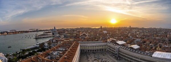 Panorama, St Mark's Square and Basilica di Santa Maria della Salute on the Grand Canal at sunset,