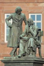 Brothers Grimm national monument, standing Jacob and sitting on the chair Wilhelm, brothers, bronze
