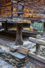 Old barn on wooden supports and stone slabs, historic village centre, Grimentz, Val d'Anniviers,