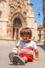 Child having fun in the church of Santa María la Real in Aranda de Duero in the province of Burgos.