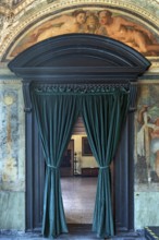 Passageway with velvet curtain in the upper rooms of the Villa del Principe, Palazzo di Andrea