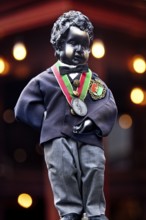 Replica of the bronze statue Manneken Pis by Jérôme Duquesnoy with costume, landmark, Brussels,
