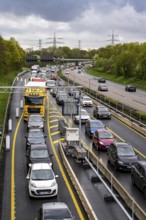 Weighing and barrier system on the A42 motorway, in front of the dilapidated motorway bridge over