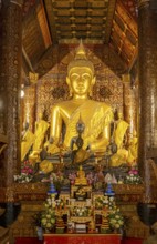 Buddha image at Wat Xieng Thong Sim ordination hall, Luang Prabang, Laos