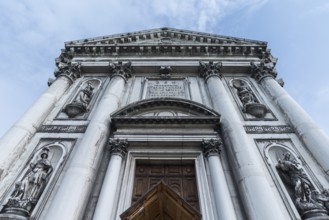 Allegories on the main façade of the church of Santa Maria del Rosario, 17th century, Venice,