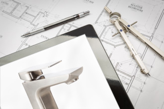 Computer Tablet Showing Custom Faucet On House Plans, Pencil, Compass