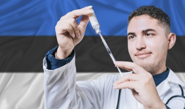 Doctor holding syringe on Estonia flag background. Medical professional holding syringe with
