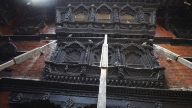 Detailed view of artfully carved facades, Kumari Ghar at Durbarsquare in Kathmandu with detailed