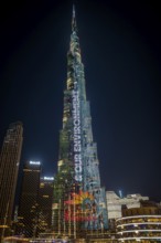 Night shot, illuminated advertising at the Burj Khalifa, Downtown, Dubai, United Arab Emirates