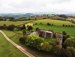 Autumn Colours over ruins of Pembridge Castle or Newland Castle from a drone, Herefordshire,