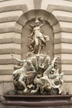 Fountain sculpture Power to the Sea, St Michael's Wing of the Hofburg Imperial Palace Palace in