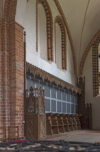 Gothic choir stalls in the interior of St Mary's Church, Brick Gothic, Klütz, Mecklenburg-Western