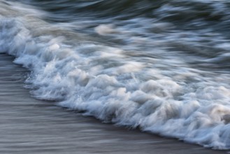 Wave play at sunrise on the chalk coast in Jasmund National Park, Rügen, Sassnitz,