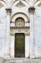 Entrance to the church of San Frediano, historic city centre, Lucca, Tuscany, Italy