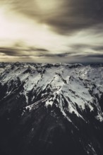 Flight over the late winter Lech Valley with a small aeroplane in Tyrol, Austria