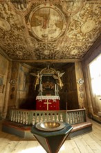 Interior with a view of the altar in Lom Stave Church (Lom stavkyrkje), Lom, Norway