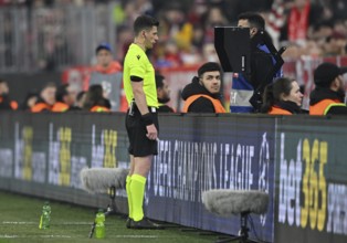 Referee Benoit Bastien (FRA) on monitor VAR, video assistant referee, video evidence, video referee