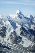 Snow and ice, epic mountains with glaciers, aerial view, Alaska Range, Denali National Park,
