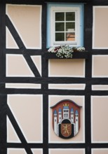 Half-timbered houses with town coat of arms, Deutsche Fachwerkstrasse, Hann. Münden or Hannoversch