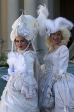 Costume wearers at the Venetian Fair, in the castle courtyard, Ludwigsburg, Baden-Württemberg,