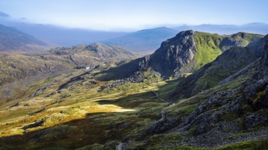 Autumn colours of Pen-y-Pass over Miner's Track, Start Point and road A4086, Snowdonia, Wales, UK
