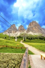 Cable cars transporting tourists up the scenic sella pass in the dolomites, italy, during a