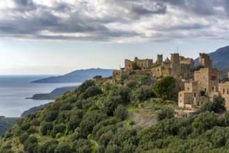 A view of Vathia, a historic abandoned village in Mani Peninsula, Greece, with traditional stone