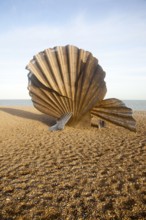 Scallop sculpture by artist Maggi Hambling, on shingle beach at Aldeburgh, Suffolk, England, United