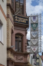 Nose sign of the Bratwurst Glöckle inn, Neo-Renaissance, 1899, Bad Kissingen, Lower Franconia,