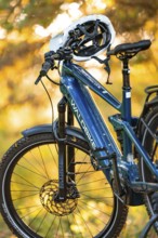Close-up of a blue bicycle with helmet in the forest, e-bike, forest bike, Calw, district of Calw,