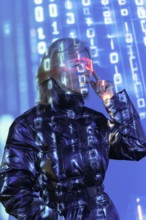 An elderly Asian woman engages with the metaverse, wearing futuristic glasses. Digital numbers