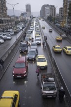 Damascus, Syria. December 6th 2025. A wet and busy with traffic Al Thawra street in downtown