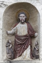 Blessing Christ, figure above the entrance, early Romanesque monastery church of St. Cyriak,