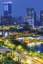Chengdu skyline with Anshun Bridge over Jin River at night in Chengdu, China