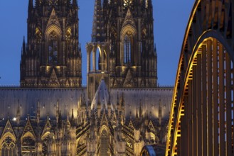 Cologne Cathedral and the Hohenzollern Bridge illuminated with LED lights, Cologne, North