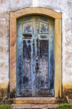 Carved wooden gate in an old baroque church in the city of Ouro Preto in Minas Gerais