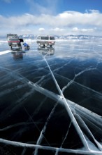 Cars on ice, Lake Baikal, Olkhon Island, Pribaikalsky National Park, Irkutsk Province, Siberia,