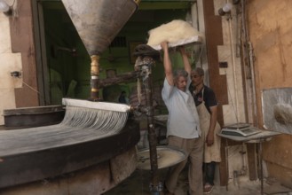 Rosetta, Egypt. June 27th 2024 Preparation of filo dough to make Egyptian Knafeh and Qatayef a