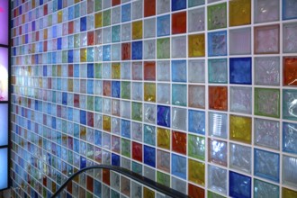 Wall with colored glass blocks in a stairwell, Nuremberg, Middle Franconia, Bavaria, Germany