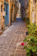 Scenic picturesque streets of Chania venetian town with coloful old houses. Chania greek village in