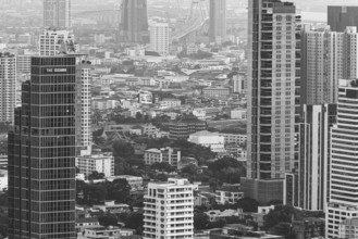 Over the rooftops of Bangkok, view from the Moon Bar on the roof terrace of the Banyan Tree hotel,
