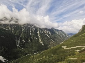 Wide mountain landscape with clouds floating gently above the peaks, Zakopane, hiking in the High