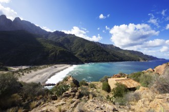 View of the pebble beach and Porto Bay, a UNESCO World Heritage Site, Ota, west coast of Corsica,