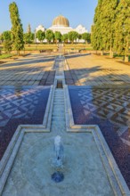 Park of the Sultan Qaboos Mosque, behind the mosque with the domes and minarets, Muscat, Arabian