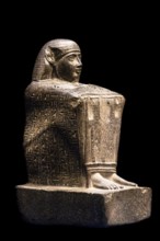 Block statue of the vizier Paser with emblems of the gods of Thebes, from the exhibition: Ramses