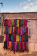 Wool for drying in the dyer's souk, colours, basic colours, presentation, wall, facade, house
